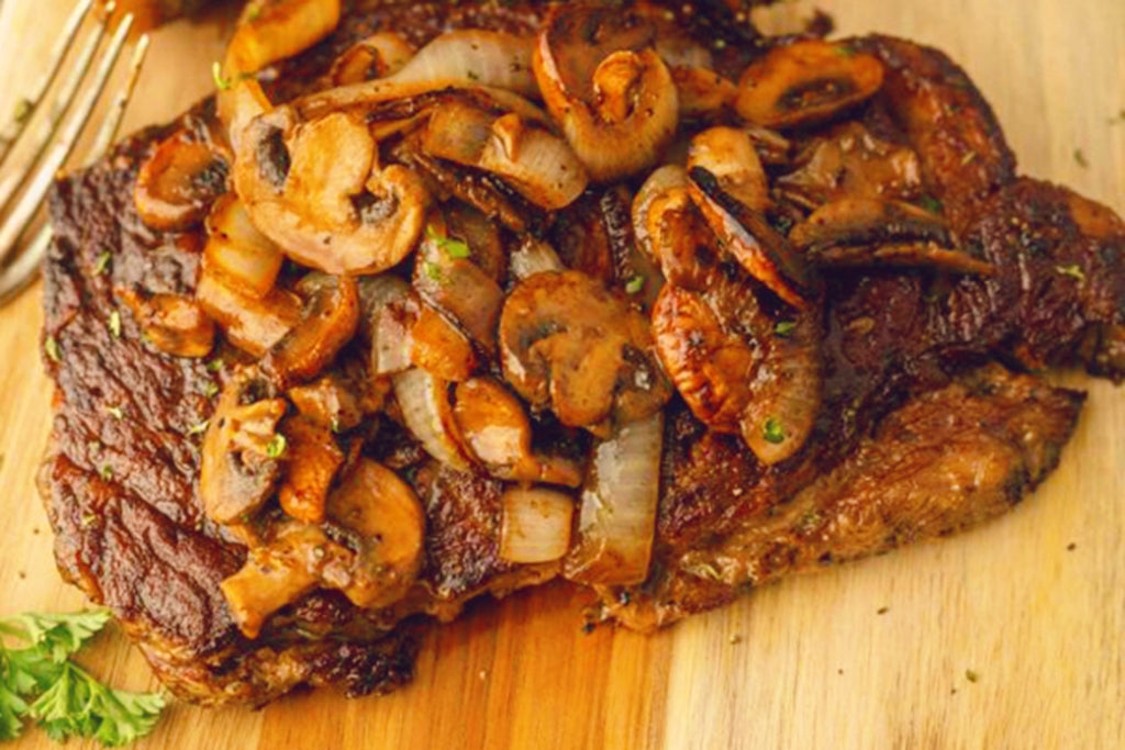 Rib Eye Steaks with Mushrooms and Onions